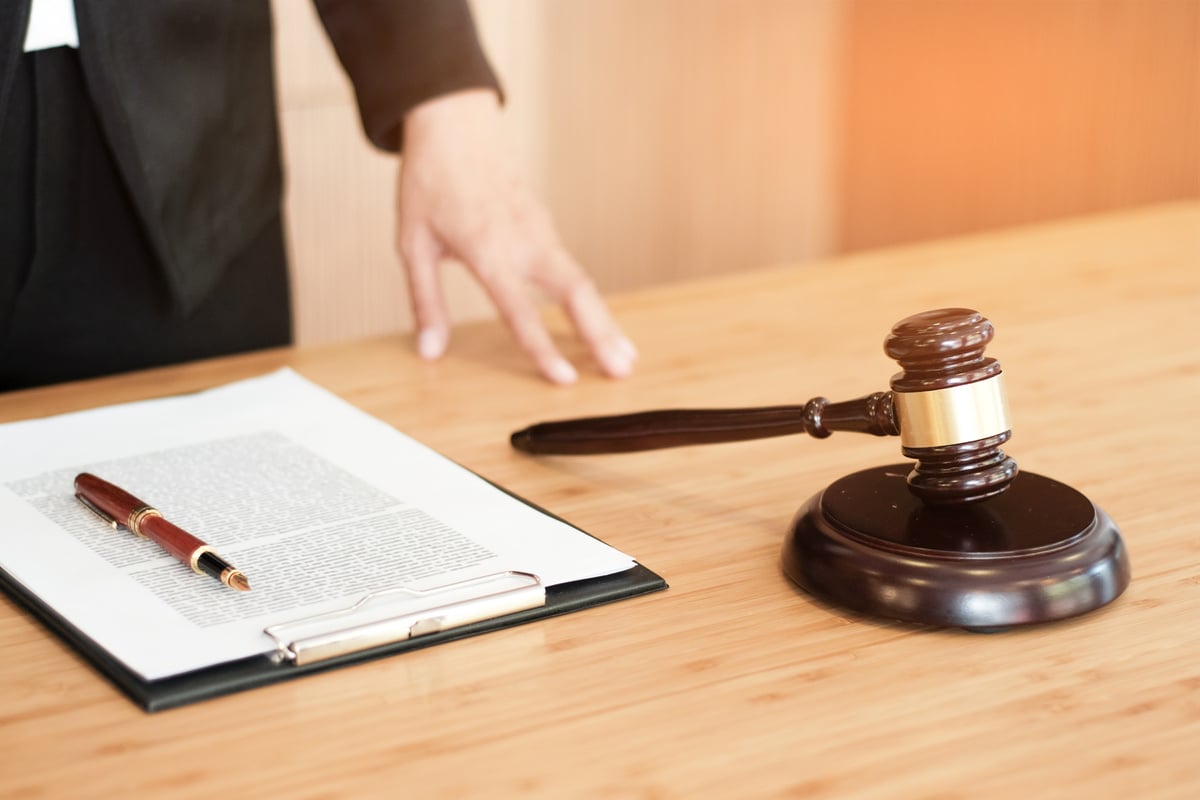 Legal counsel presents to the client a signed contract with gave