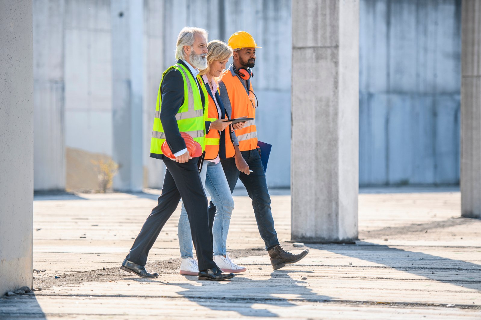 Project Team Walking Through Construction Site